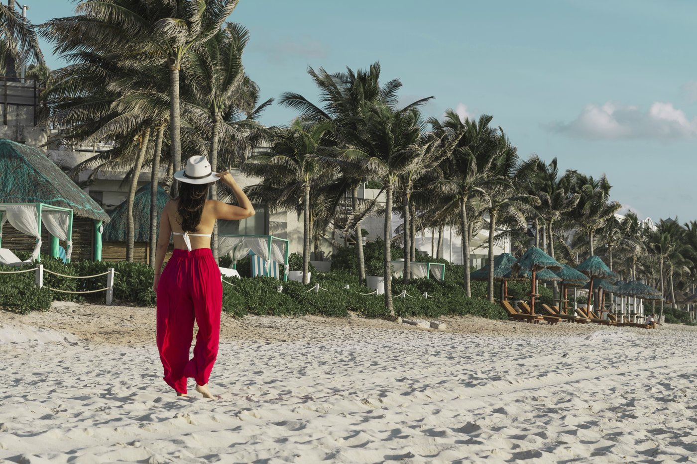 Gallery of Beach: Woman with a girl playing on the beach at the hotel Grand Oasis Cancun.