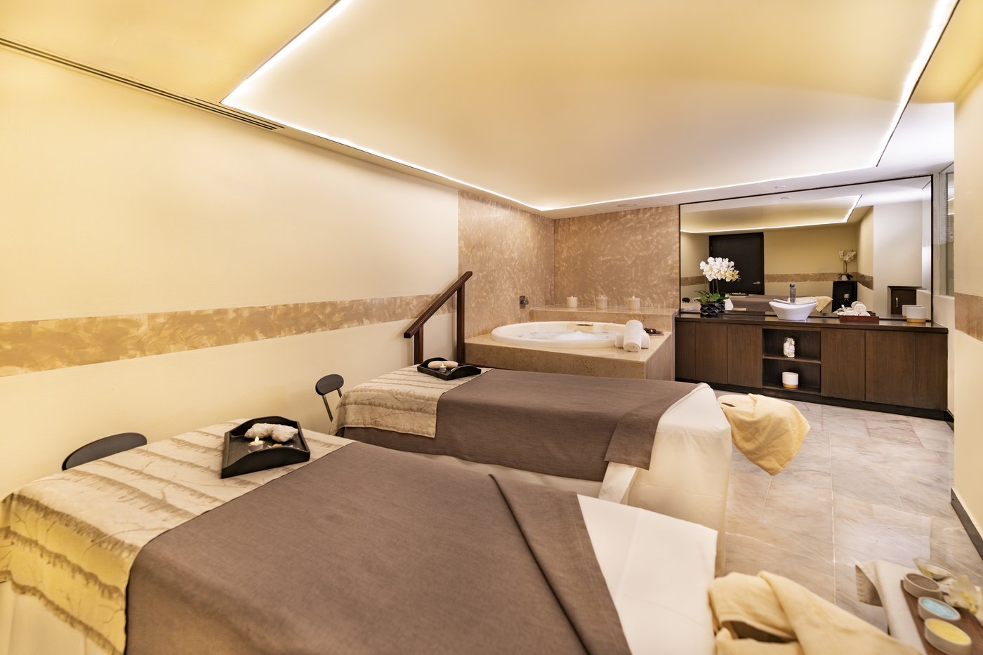 Gallery of Spa: Massage room with treatment beds at the spa of the hotel Grand Oasis Cancun.