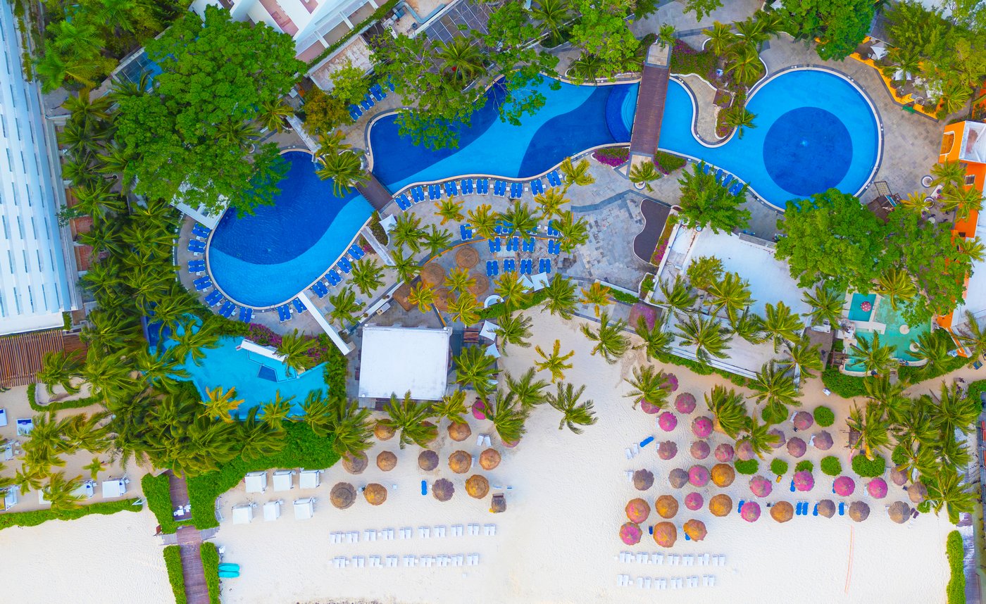 Aerial view of the Grand Oasis Palm hotel pools.