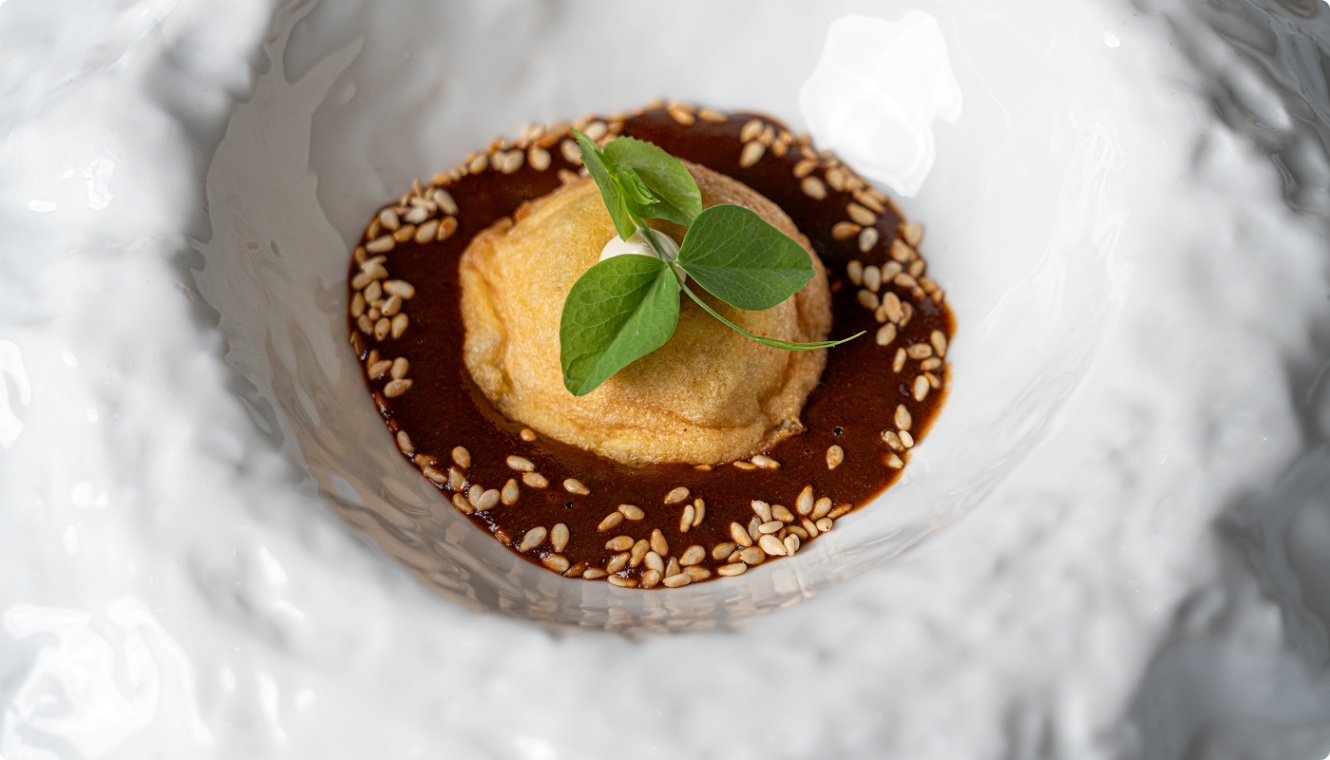 Rabbit shoulder in "civet" sauce with warm apple jelly in Benazuza Restaurant at The Pyramid at Gran